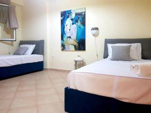 Posteľ alebo postele v izbe v ubytovaní Sime Villa Private Beach