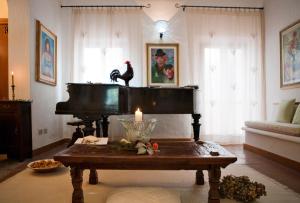 TV a/nebo společenská místnost v ubytování Hotel Gallo Nero