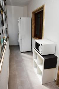 Kuchyň nebo kuchyňský kout v ubytování Giestal Terrace