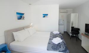 Llit o llits en una habitació de Edem