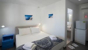 Llit o llits en una habitació de Edem