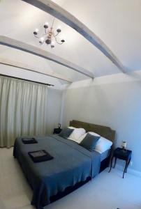 Postel nebo postele na pokoji v ubytování Villa Kertelhof Guesthouse