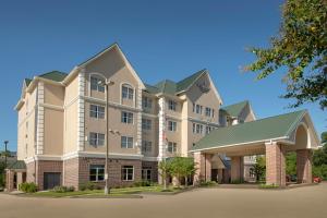 a rendering of the front of a hotel at Country Inn & Suites by Radisson, Houston Intercontinental Airport East, TX in Humble