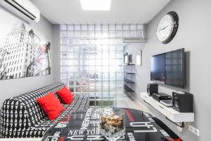 TV a/nebo společenská místnost v ubytování Chueca Apartment