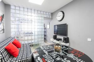 TV a/nebo společenská místnost v ubytování Chueca Apartment