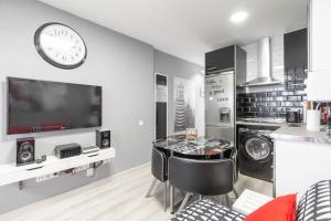 Kuchyň nebo kuchyňský kout v ubytování Chueca Apartment