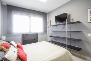 Postel nebo postele na pokoji v ubytování Chueca Apartment