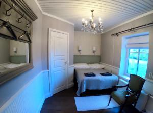 Postel nebo postele na pokoji v ubytování Villa Kertelhof Guesthouse