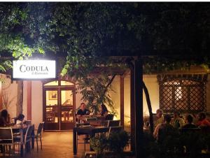 Restoran või mõni muu söögikoht majutusasutuses Hotel Il Querceto