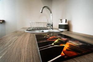 Kuchyňa alebo kuchynka v ubytovaní Ania Apartamenty