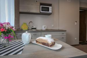 Kuchyňa alebo kuchynka v ubytovaní Ania Apartamenty