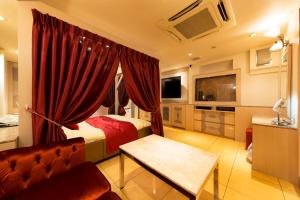 Kuchyň nebo kuchyňský kout v ubytování Hotel Luna Ikeda (Adult Only)