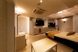 TV a/nebo společenská místnost v ubytování Hotel Luna Ikeda (Adult Only)