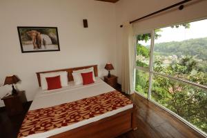 Postelja oz. postelje v sobi nastanitve Hotel See Kandy