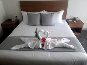 Кровать или кровати в номере Nalagi Hotel