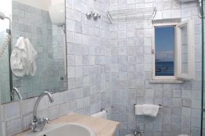 Koupelna v ubytování Hotel Gennarino A Mare