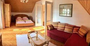 Posezení v ubytování Napostó Pihenőház - Sunnylake Suites