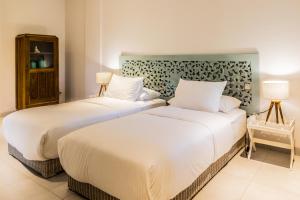 Ένα ή περισσότερα κρεβάτια σε δωμάτιο στο Silversand Villa +67 φωτογραφίες