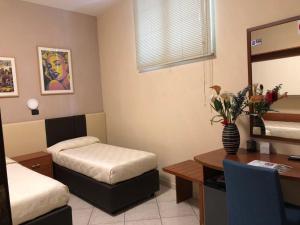 Postel nebo postele na pokoji v ubytování B&B Primerano SP73
