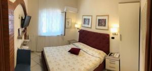 Postel nebo postele na pokoji v ubytování B&B Primerano SP73