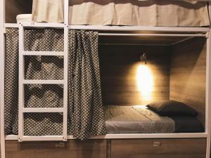 Postel nebo postele na pokoji v ubytování Cantagua Hostel