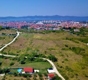 an aerial view of a town on a hill at Romantic Villa Cherry in Zadar