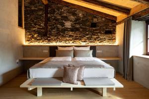 Postel nebo postele na pokoji v ubytování rössl bianco b&b&b
