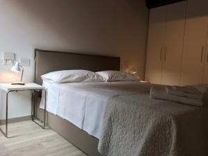 Llit o llits en una habitació de Moderno affaccio su via Mazzini