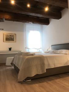 Llit o llits en una habitació de Moderno affaccio su via Mazzini