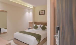 Postel nebo postele na pokoji v ubytování Hotel West Blue