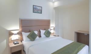 Postel nebo postele na pokoji v ubytování Hotel West Blue