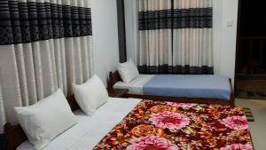 Voodi või voodid majutusasutuse Tea Breeze Motel toas