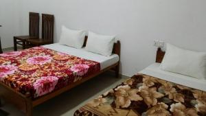 Voodi või voodid majutusasutuse Tea Breeze Motel toas