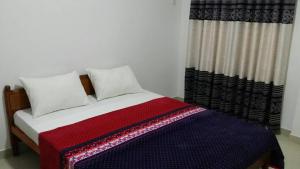 Voodi või voodid majutusasutuse Tea Breeze Motel toas