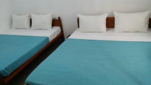 Voodi või voodid majutusasutuse Tea Breeze Motel toas