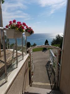 a view from the balcony of a house overlooking the ocean at Silver Beach Apart Complex in Byala