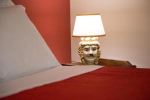 A bed or beds in a room at Sicily's View