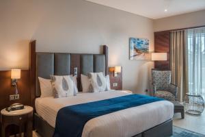 Кровать или кровати в номере Hotel Verde Zanzibar - Azam Luxury Resort and Spa - Dry Hotel