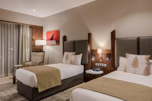 Кровать или кровати в номере Hotel Verde Zanzibar - Azam Luxury Resort and Spa - Dry Hotel
