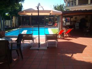 The swimming pool at or close to VILLA SINGOLA -SOLE-LUNA-Casavilladusoleil