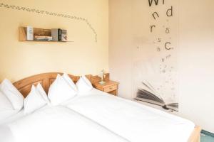 Garni Haus Sonnleitn - Adults only客房内的一张或多张床位