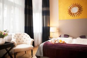 Postel nebo postele na pokoji v ubytování Hotel Elba am Kurfürstendamm - Design Chambers