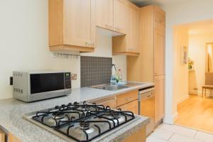 Η κουζίνα ή μικρή κουζίνα στο Large 2 Bedroom 2 Bathroom Apartment in Westminster