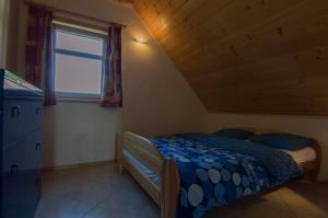 Posteľ alebo postele v izbe v ubytovaní Sno House