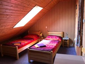 Ένα ή περισσότερα κρεβάτια σε δωμάτιο στο Guest House U Náhonu