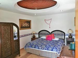 Hotel Posada Mexicana tesisinde bir odada yatak veya yataklar