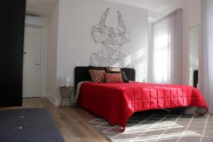 Ένα ή περισσότερα κρεβάτια σε δωμάτιο στο In Barcelos Hostel & Guest House