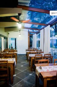 Reštaurácia alebo iné gastronomické zariadenie v ubytovaní Pousada dos Pinheirais