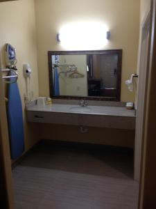 Koupelna v ubytování Executive Inn