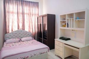 Postel nebo postele na pokoji v ubytování Homestay Jasmin Indah, Senawang (free wifi)
